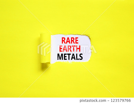 Rare earth metals symbol. Concept words Rare earth metals on beautiful white paper. Beautiful yellow paper background. Business and rare earth metals concept. Copy space. 123579766