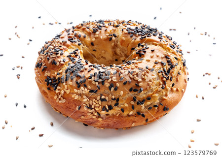 Bagel with sesame seeds, on a white background Bagel with sesame seeds, on a white background 123579769