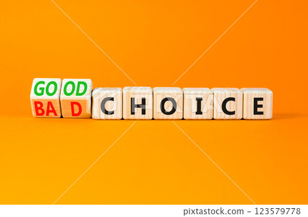 Good or bad choice symbol. Concept words Good choice or Bad choice on beautiful wooden blocks. Beautiful orange table orange background. Business good or bad choice concept. Copy space. 123579778