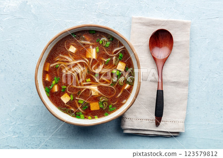 Tofu soup, Japanese cuisine. Miso soup with bean curd and green onions Tofu soup, Japanese cuisine. Miso soup with bean curd and green onions 123579812