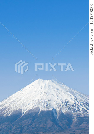 Snow-capped Mount Fuji seen from the summit on a clear day Snow-capped Mount Fuji seen from the summit on a clear day 123579828