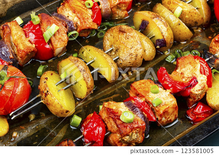 Grilled meat skewers with potatoes. Grilled meat skewers with potatoes. 123581005