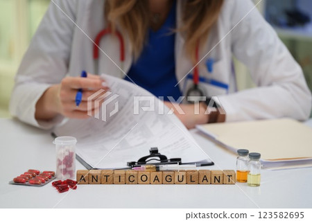 A Healthcare Professional Conducting a Thorough Review of Anticoagulant Medications Protocols 123582695