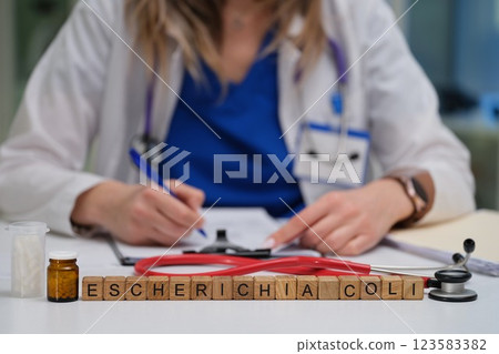 Healthcare Professional Conducting a Thorough Analysis of an Escherichia Coli Sample Healthcare Professional Conducting a Thorough Analysis of an Escherichia Coli Sample 123583382