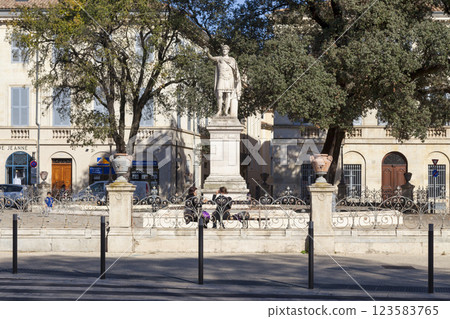 The statue of Emperor Antoninus in Nimes 123583765