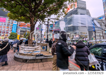 Tokyo cityscape in Japan: Shibuya bustling with foreign tourists amid the return of bitter cold and rain on March 4th Tokyo cityscape in Japan: Shibuya bustling with foreign tourists amid the return of bitter cold and rain on March 4th 123583929