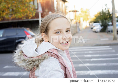 Happy young girl walking outdoors. Portrait of child 10 years old Happy young girl walking outdoors. Portrait of child 10 years old 123584078