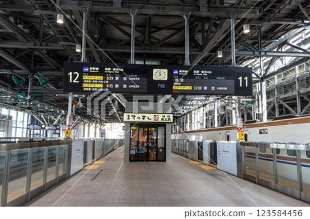 An empty railway station platform [Toyama Station on the Hokuriku Shinkansen Line] 123584456