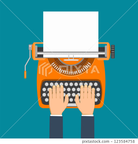 Human hands typing on vintage typewriter with paper 123584758