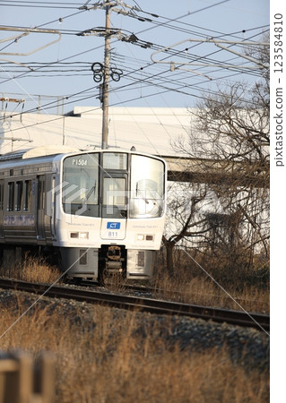 JR Kyushu train running on the Nagasaki Main Line JR Kyushu train running on the Nagasaki Main Line 123584810
