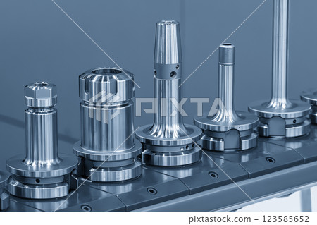 Close up scene the various type of CNC tool holder in the light blue scene. 123585652