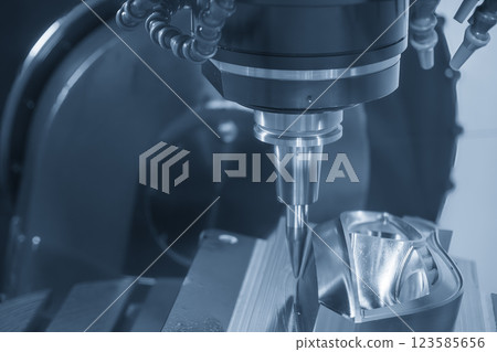 The 5-axis machining center cutting mold parts with solid barrel end mill tool in the light blue scene. 123585656