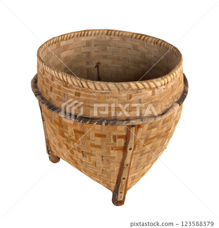Intricate handmade wicker basket with unique design and structure Intricate handmade wicker basket with unique design and structure 123588379