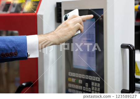 working with industrial touch screen control panel working with industrial touch screen control panel 123589127