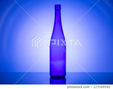 Glassware photography: creative backlight with colored gel filters Glassware photography: creative backlight with colored gel filters 123589392