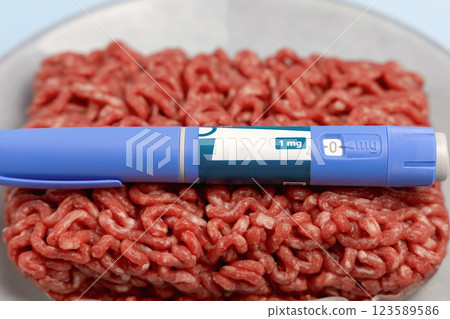 Ozempic Insulin injection pen and raw minced meat for diabetics and weight loss. Ozempic Insulin injection pen and raw minced meat for diabetics and weight loss. 123589586