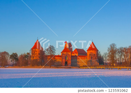 Trakai castle at winter, beautiful medieval castle in the evening light. Lithuania Trakai castle at winter, beautiful medieval castle in the evening light. Lithuania 123591062
