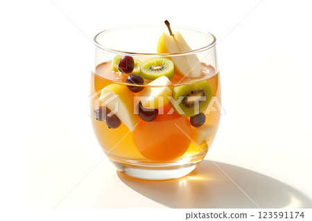 A glass of fruit juice with a variety of fruits in it 123591174