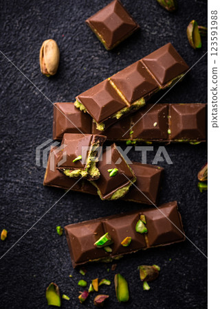 Dubai chocolate with kadayif pistachio filling Dubai chocolate with kadayif pistachio filling 123591988