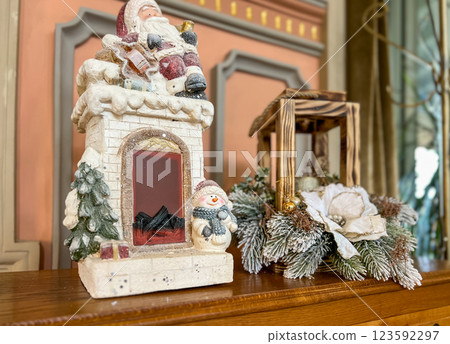Christmas tree decoration with ornaments and orchids, close up. New Year and Christmas celebration concept Christmas tree decoration with ornaments and orchids, close up. New Year and Christmas celebration concept 123592297