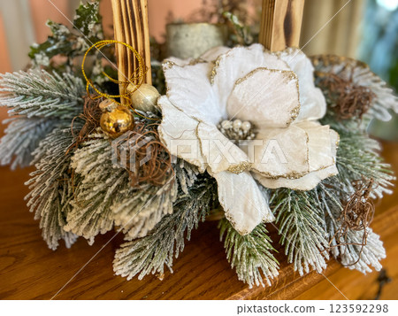 Christmas tree decoration with ornaments and orchids, close up. New Year and Christmas celebration concept 123592298
