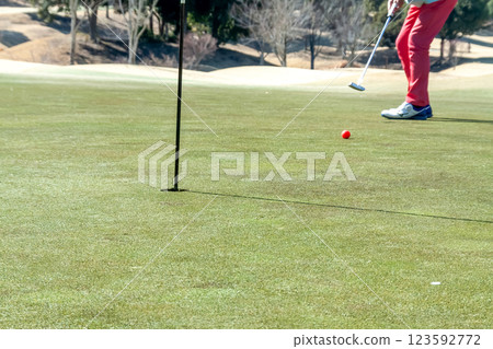 Image of putting on the golf green [Winter] 123592772