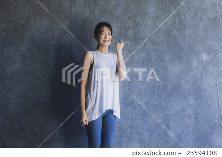 Middle-aged woman in sportswear Middle-aged woman in sportswear 123594108