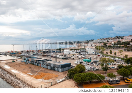 Drone view of cargo containers at commercial dock Drone view of cargo containers at commercial dock 123594345
