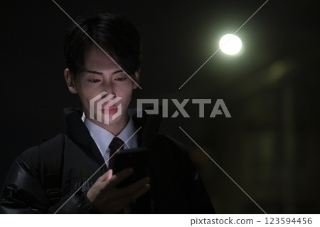Businessman returning home late at night 123594456