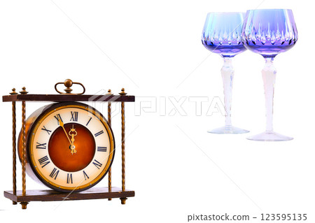 Time for drink.Antique brown gold clock and two turquoise wine glasses Time for drink.Antique brown gold clock and two turquoise wine glasses 123595135
