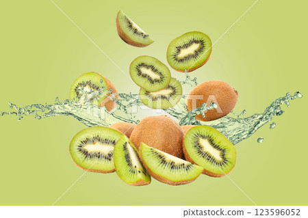 Fruits, Kiwis and green water on light green background Fruits, Kiwis and green water on light green background 123596052