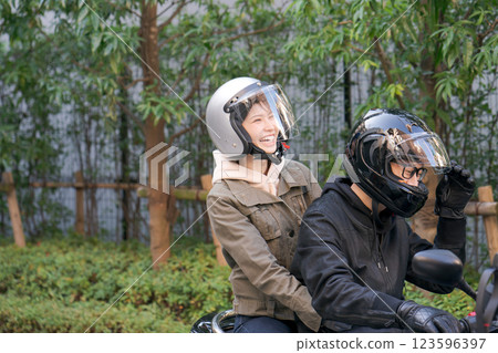 men and women riding bikes 123596397