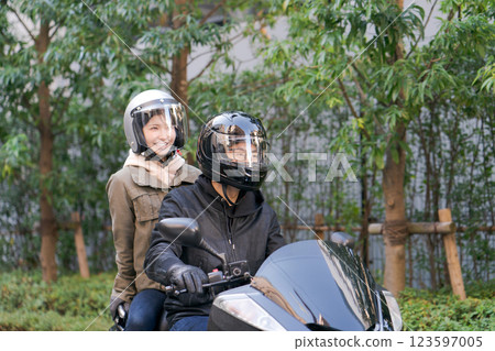 Couple riding a bike Couple riding a bike 123597005