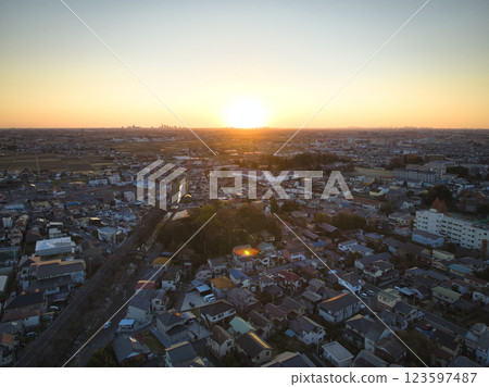 The streets of Kawagoe dyed in the first sunrise of the year, Kawagoe City, Saitama Prefecture (aerial photography by drone) 123597487