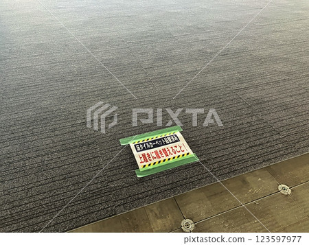 Caution signs for changing indoor shoes onto finished floors Caution signs for renovation work 123597977