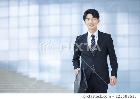 Business, end of life, young man wearing a suit Business, end of life, young man wearing a suit 123598613