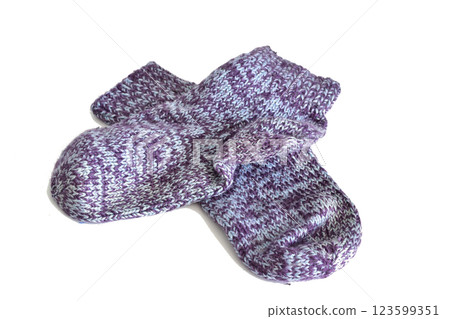 Warm socks knitted from woolen thread. 123599351