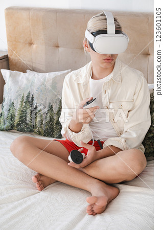 Teenager Exploring Virtual Reality at Home. Teenager Exploring Virtual Reality at Home. 123601105