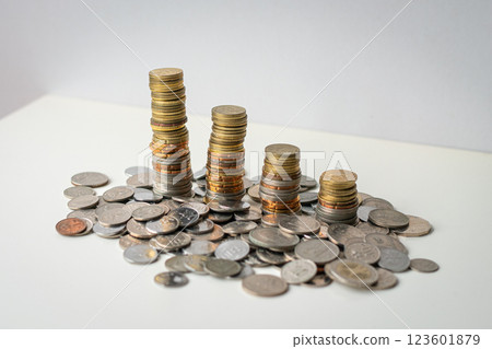 Coins stacked in a row, from high to low. Coins stacked in a row, from high to low. 123601879