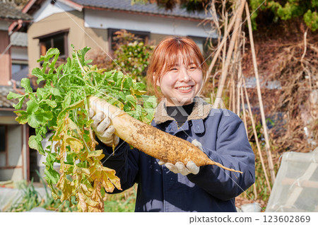 Woman working in the fields, country life, home garden Woman working in the fields, country life, home garden 123602869