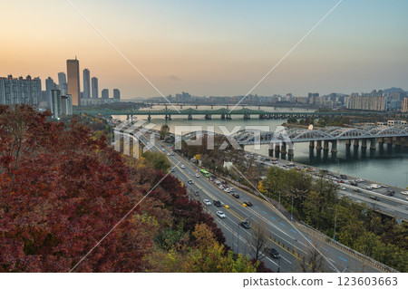 Seoul South Korea sunset city skyline at Hangang Bridge Nodeulseom Island and Han River view from Yongbongjeong Park in autumn 123603663