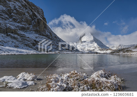 Zermatt Switzerland nature landscape at Matterhorn mountain peak and Riffelsee lake in winter season Zermatt Switzerland nature landscape at Matterhorn mountain peak and Riffelsee lake in winter season 123603681