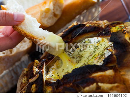 French cuisine, camembert cheese melted in fresh bread French cuisine, camembert cheese melted in fresh bread 123604192