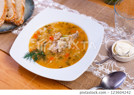 Rassolnik - Traditional Russian soup with pickled cucmbers Rassolnik - Traditional Russian soup with pickled cucmbers 123604242