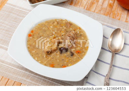 Pearl barley soup with pork and mushrooms Pearl barley soup with pork and mushrooms 123604553