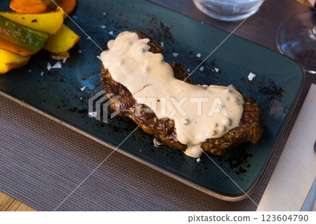 Beef steak with pepper sauce 123604790