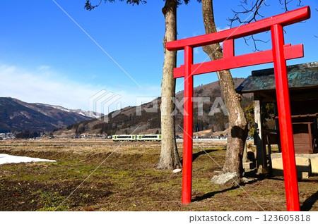 A view of the original Japanese landscape, Tono City, with a view of the shrine and the railway near Ayaori 123605818