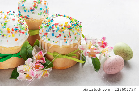 Easter cakes decorated with colorful sprinkles and spring flowers Easter cakes decorated with colorful sprinkles and spring flowers 123606757