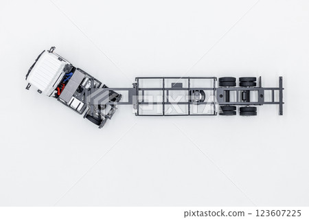 Top view white truck with cargo semi trailer on white background, The top view of transport semi truck trailer, Business logistic and transportation by semi truck trailer. Top view white truck with cargo semi trailer on white background, The top view of transport semi truck trailer, Business logistic and transportation by semi truck trailer. 123607225