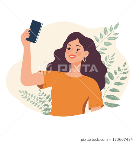 Woman takes a selfie on a smartphone camera with leaves in the background Woman takes a selfie on a smartphone camera with leaves in the background 123607454